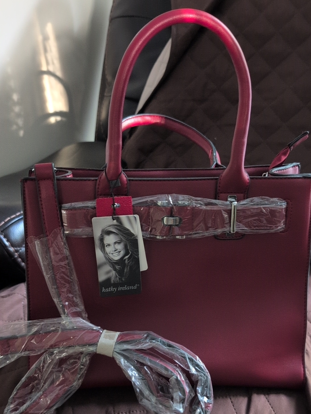 kathy Ireland structured satchel with top handles. New. Vegan leather